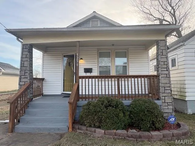 View of front facade featuring covered porch