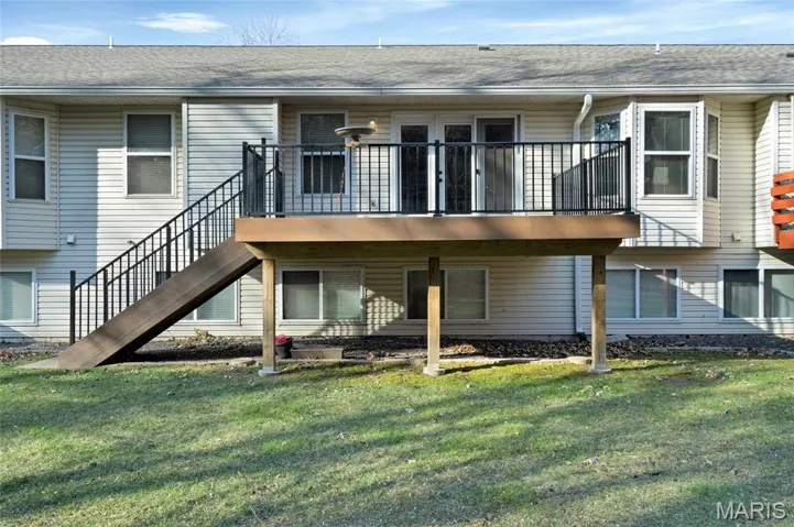 Newer maintenance free deck with transferrable warranty along with stairs.