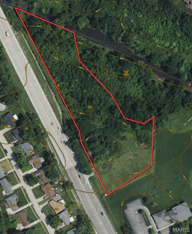Aerial view of property's location featuring property parcel outlined