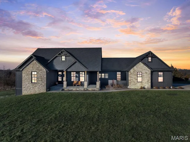 Welcome home to 111 Kentucky Derby, situated on 3 acres within the private neighborhood of Indian Creek Farms.
