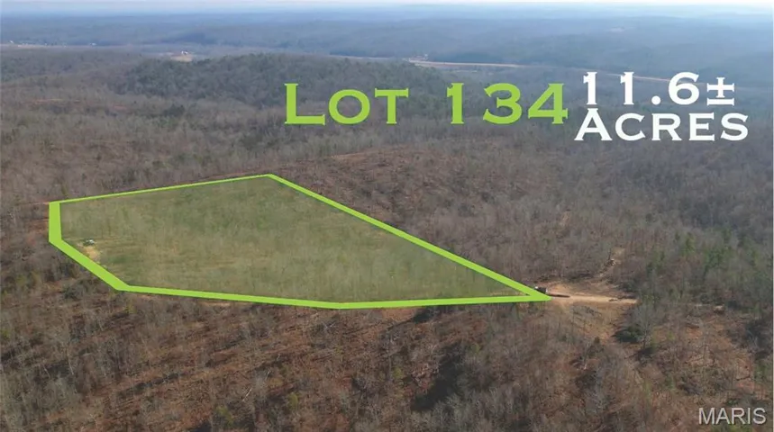 Aerial overview of property's location featuring property parcel outlined