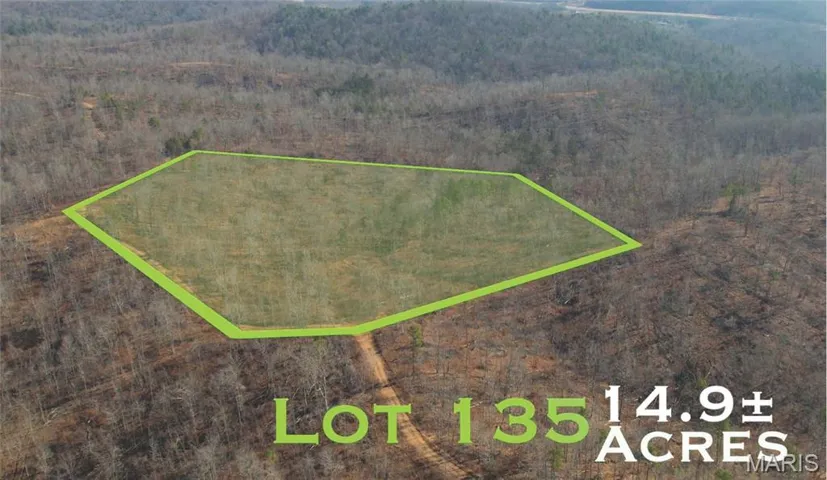 Aerial view of property and surrounding area with property boundaries highlighted and mountains