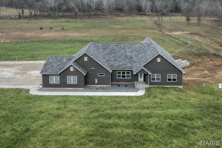 Welcome home to this custom ranch!