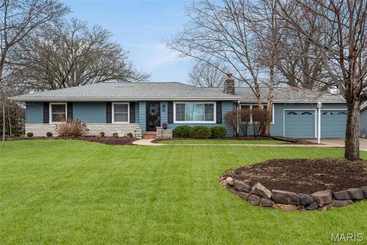 Amazing 4 bedroom colonial ranch on lovely landscaped lot.