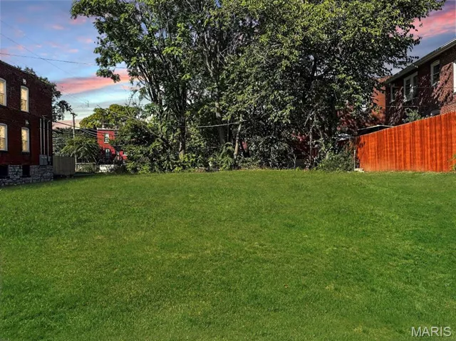 View of yard at dusk