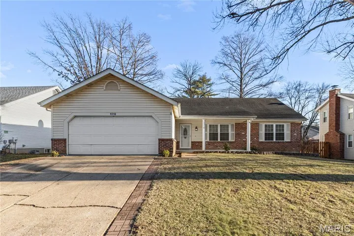 Ready ranch entrance with well maintained yard. Mature trees that do not hang over roof and wonderful neighborhood.