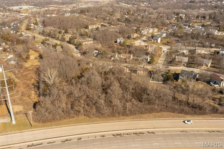 Aerial view of property and surrounding area