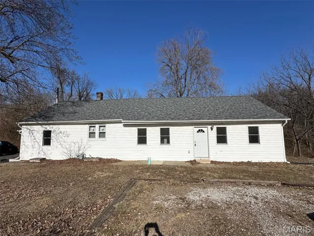 Exterior view with huge side yard!