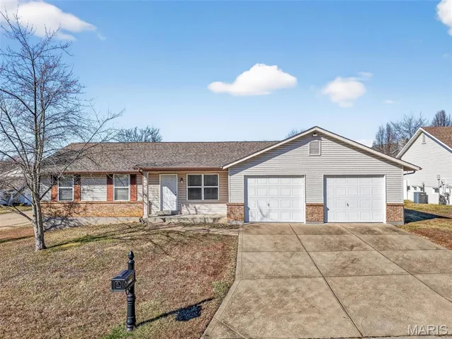 Lovely ranch on a level, corner lot with a finished lower level!
