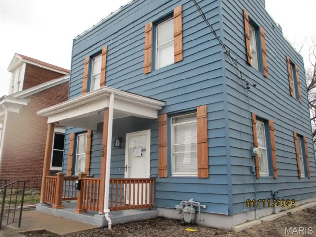 View of front of house with a porch