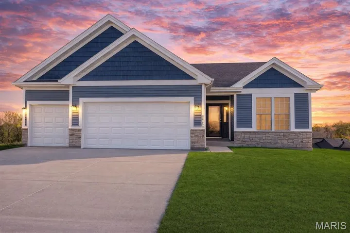 Halifax II with 3 car garage by Northern Star Homes.