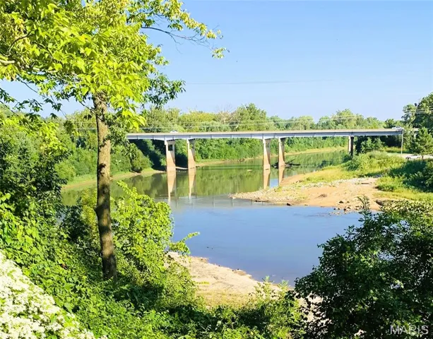 Beauty awaits behind all the trees.
