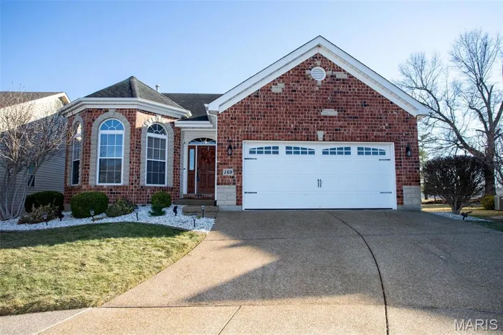 Brick/Stone Elevation, 2-Car Garage w/Carriage Style Garage Doors w/Custom Shelves & Insulation