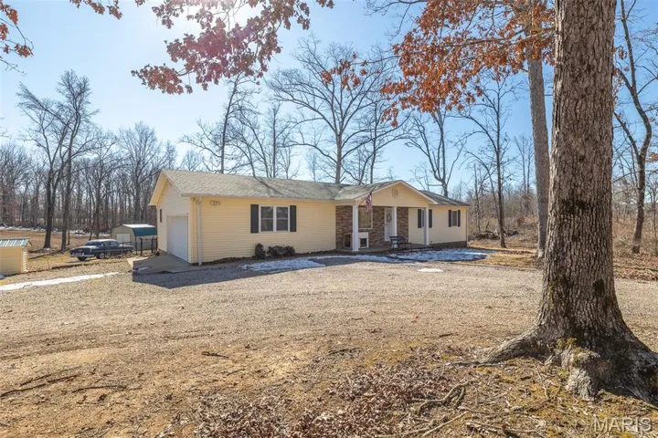 Single story home featuring an attached garage