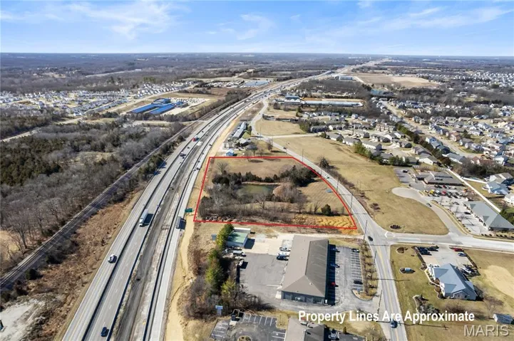 Property is outlined in red.