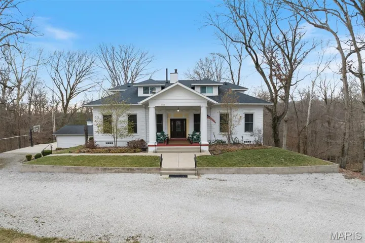Nestled among mature trees on a private, picturesque setting, this charming home offers the perfect blend of classic character and peaceful surroundings.