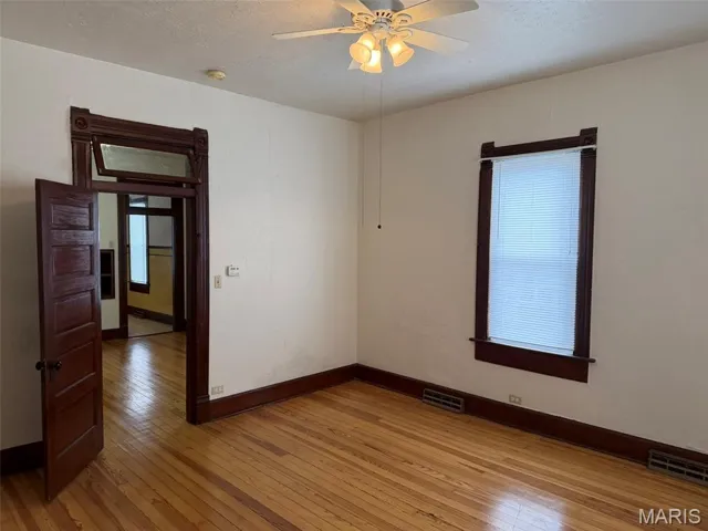 Beautiful hardwood floors in the living room and bedroom.