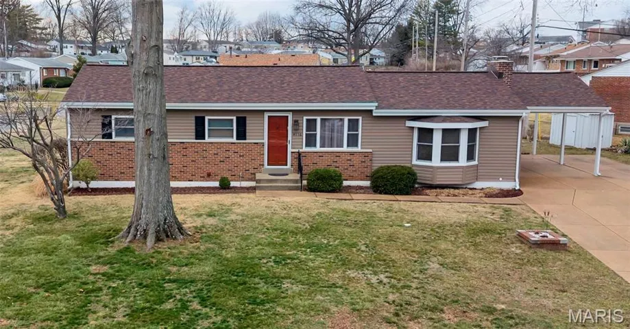 Make a great first impression with this beautifully enhanced home, showcasing new siding, roofing, fascia, gutters and a newly constructed carport -- all covered by transferable warranties.Major exterior improvements have already been completed, 2026.