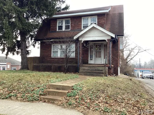 View of front facade with brick siding