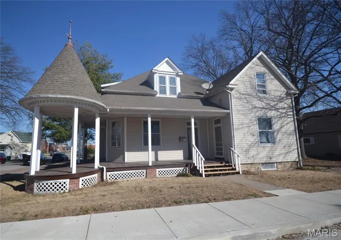 Beautiful Victorian converted into 4 separate apartments. Located across from City Hall in Millstadt