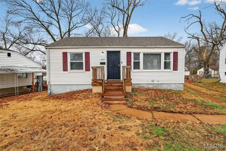 Bungalow with a shingled roof