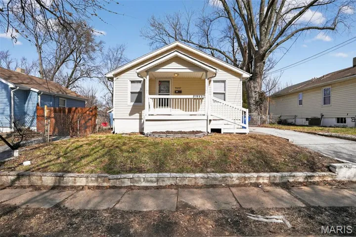 Bungalow featuring a porch