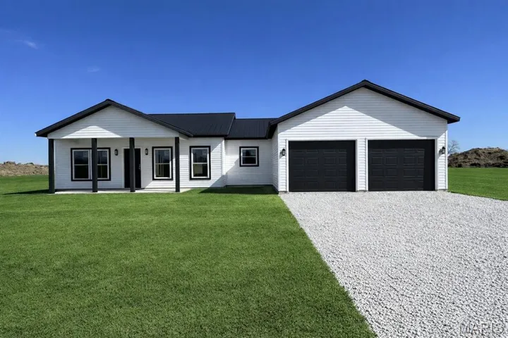 Crisp black & white for your new home at 18910 Lambeau Trail, Monroe City, MO