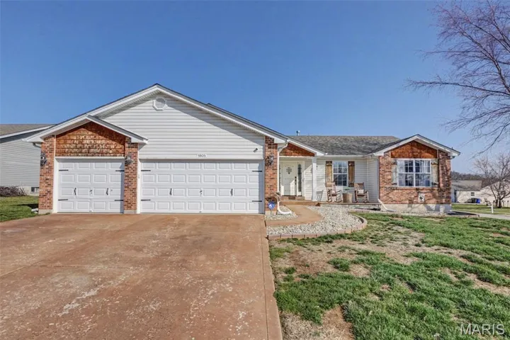 Welcome Home to 1805 Hackmann Hollow Dr!