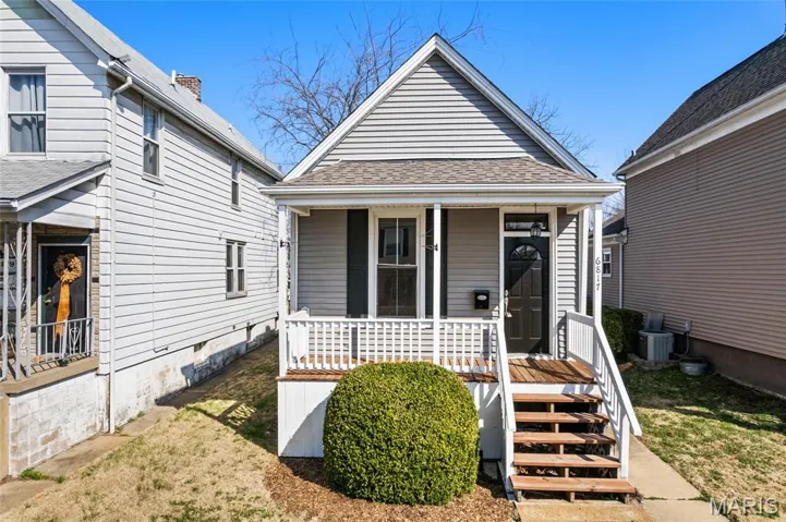 A charming front porch to watch the world go by