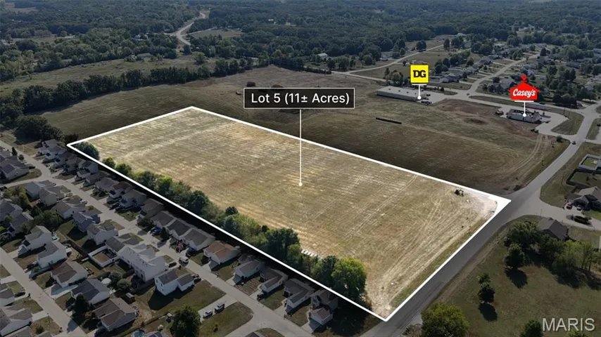 Aerial view of property and surrounding area with property parcel outlined