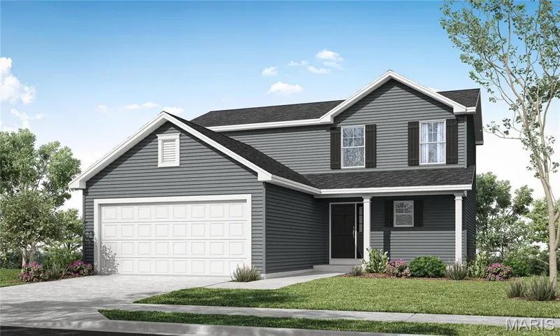View of front of home with a front yard and a garage