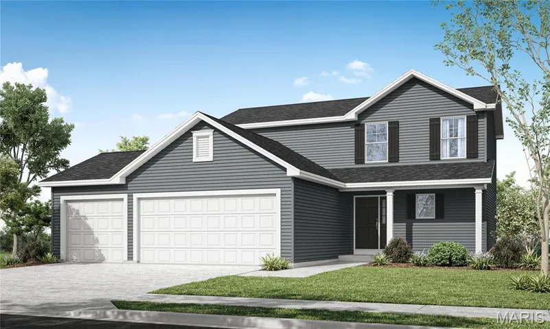 Front of property featuring a front lawn and a garage