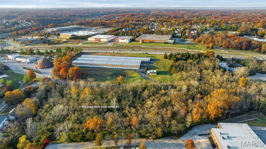 6.94 Vacant Acres Zoned M1. Looking North toward Manchester Rd.