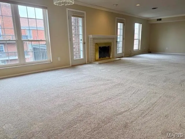 Doors flank fireplace to walk out to your private balcony