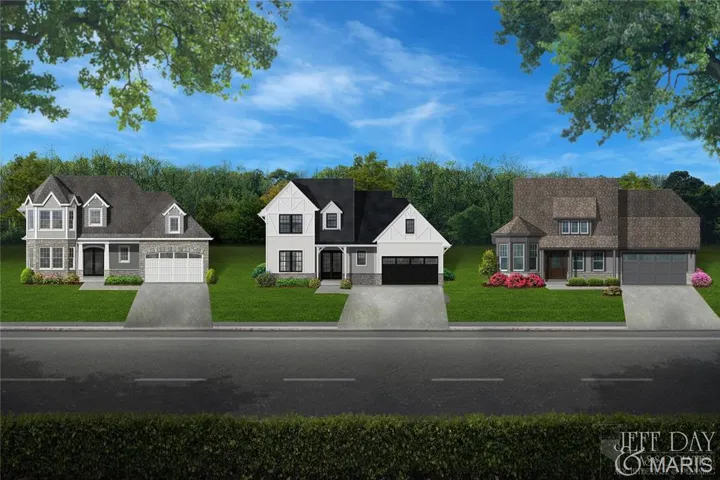 New england style home with a garage and a front yard
