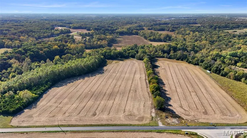 Aerial view showing 34.5 Acres at Schaper Rd and Interstate Dr. Future Interstate Drive expansion to go through the property with prime future commercial frontage