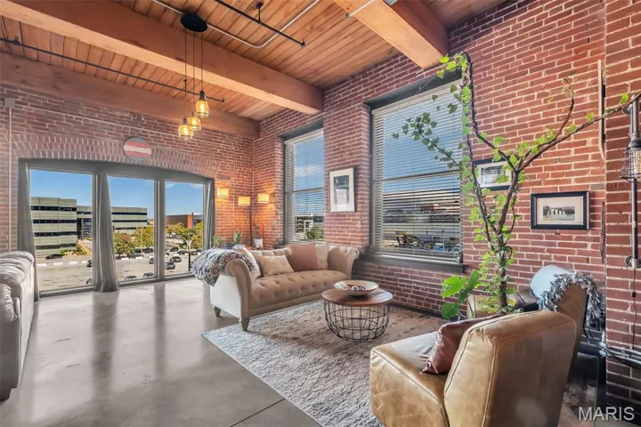 Beautiful large windows surround the living room on 3 sides.