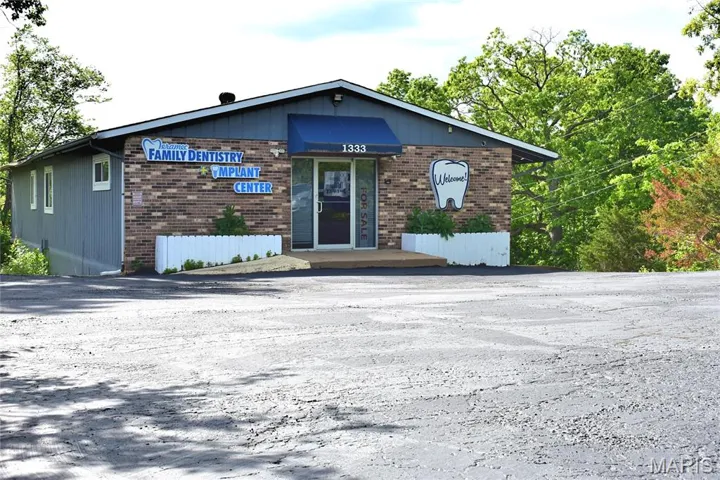 View of front facade with brick siding