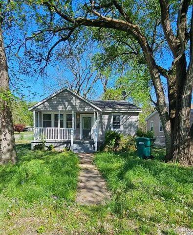 View of front of property featuring covered porch