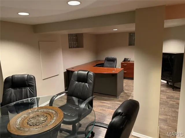 Office area with wood finished floors, baseboards, and recessed lighting