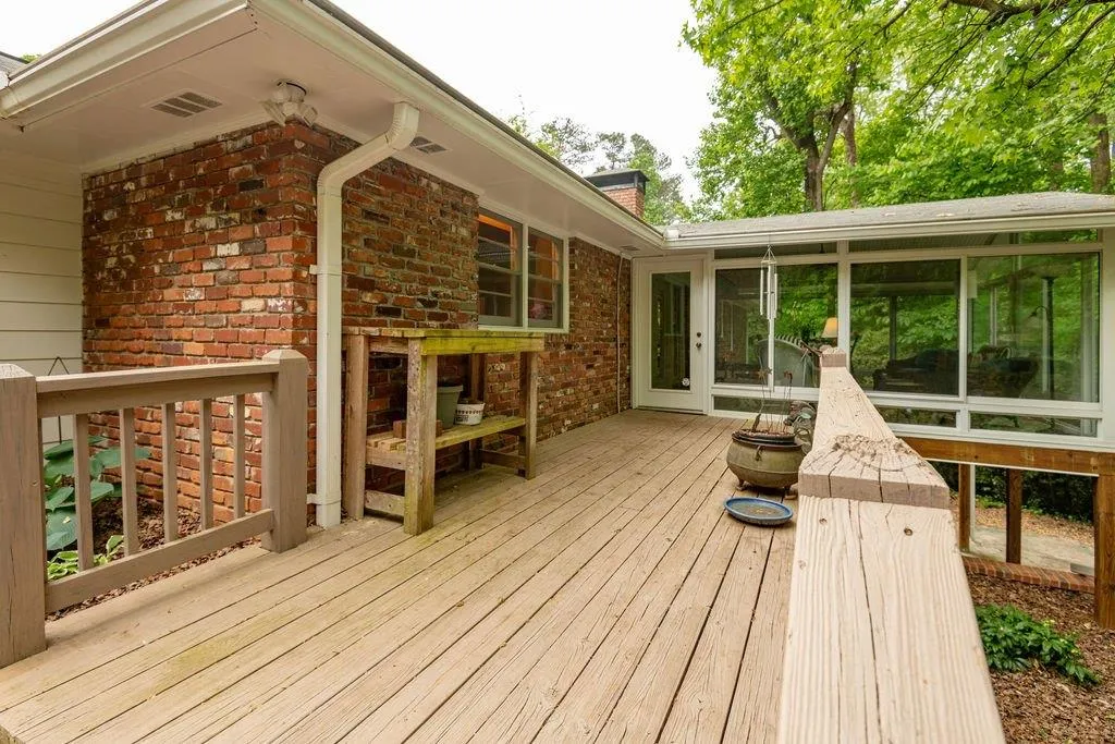 Deck from Sunroom to yard Deck from Sunroom to yard