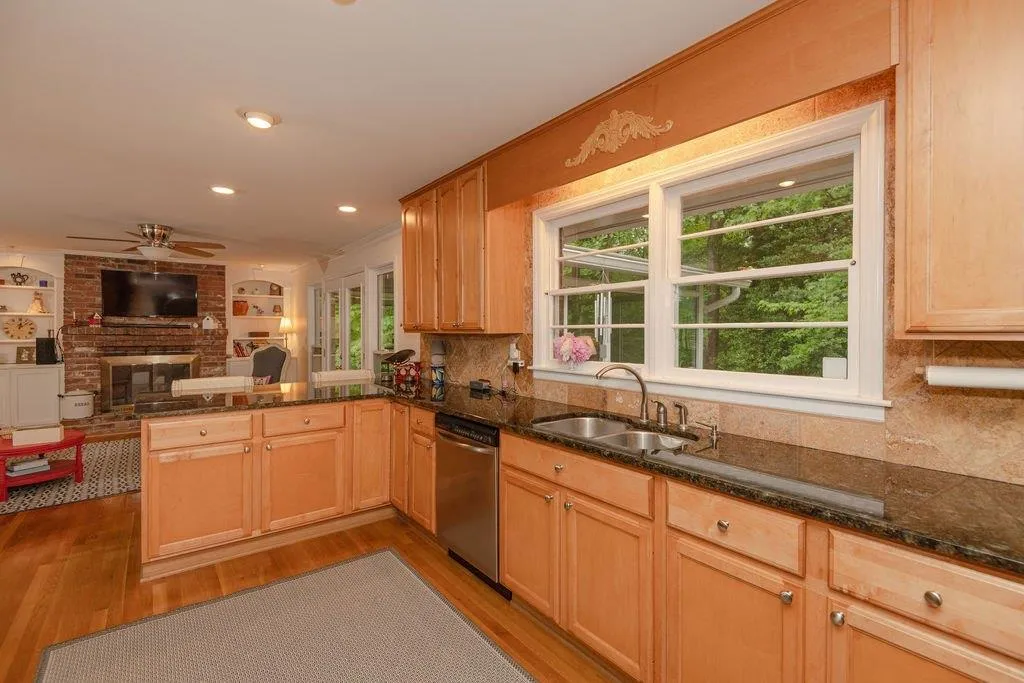 Large kitchen with granite countertops and lots of counter space Large kitchen with granite countertops and lots of counter space