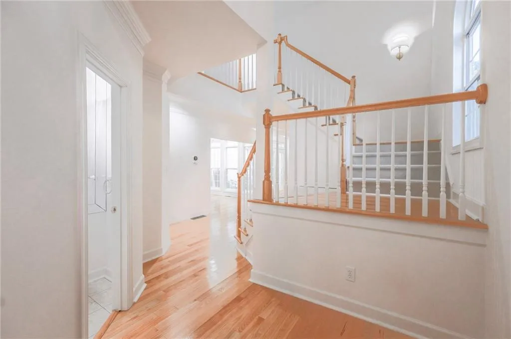 Two story foyer with dramatic entry.