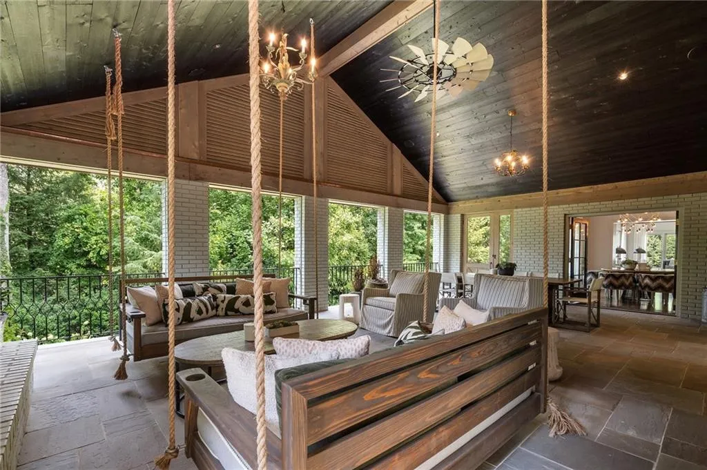 Spectacular new addition added to the house. Retractable screens, fireplace, hanging sofa's and bluestone floors.