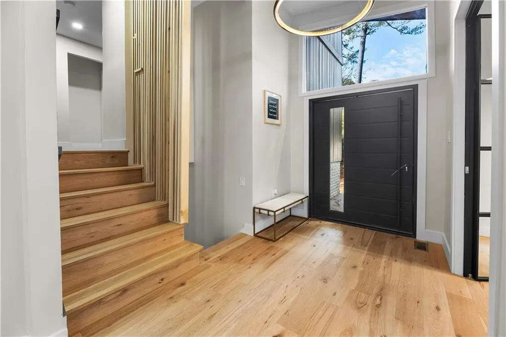 Foyer with light wood-type flooring