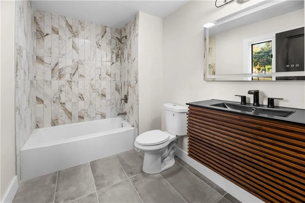 Building lobby with a sink and recessed lighting