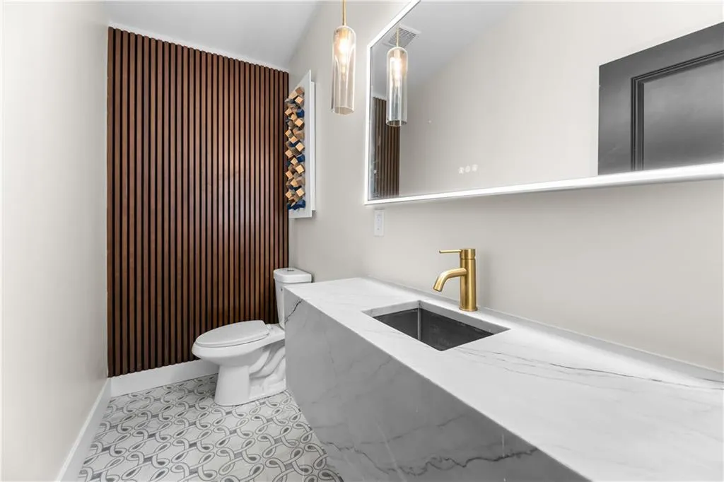 Bedroom featuring light wood-type flooring, crown molding, and recessed lighting