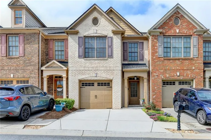 Brick and siding exterior with gabled roof lines