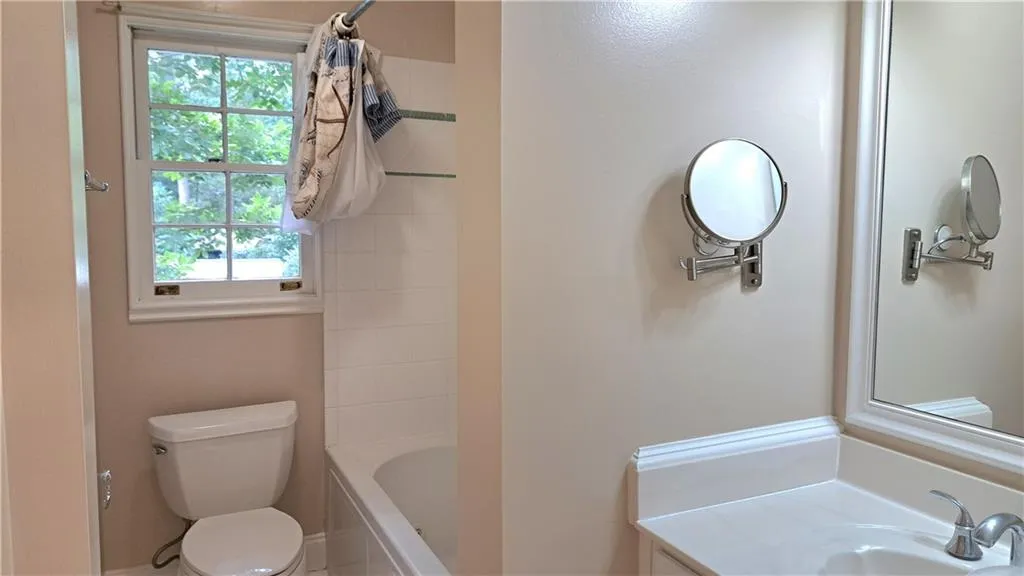 Full bath with whirlpool tubFull bath with whirlpool tub