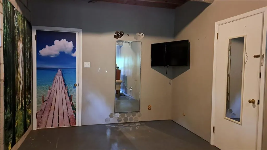 Heated & cooled, semi-finished room in basement, great for office, craft room, fitness room, etc.